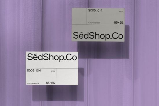 Business card mockup with elegant shadow overlay on a purple textured background, showcasing front and back design for graphic designers.